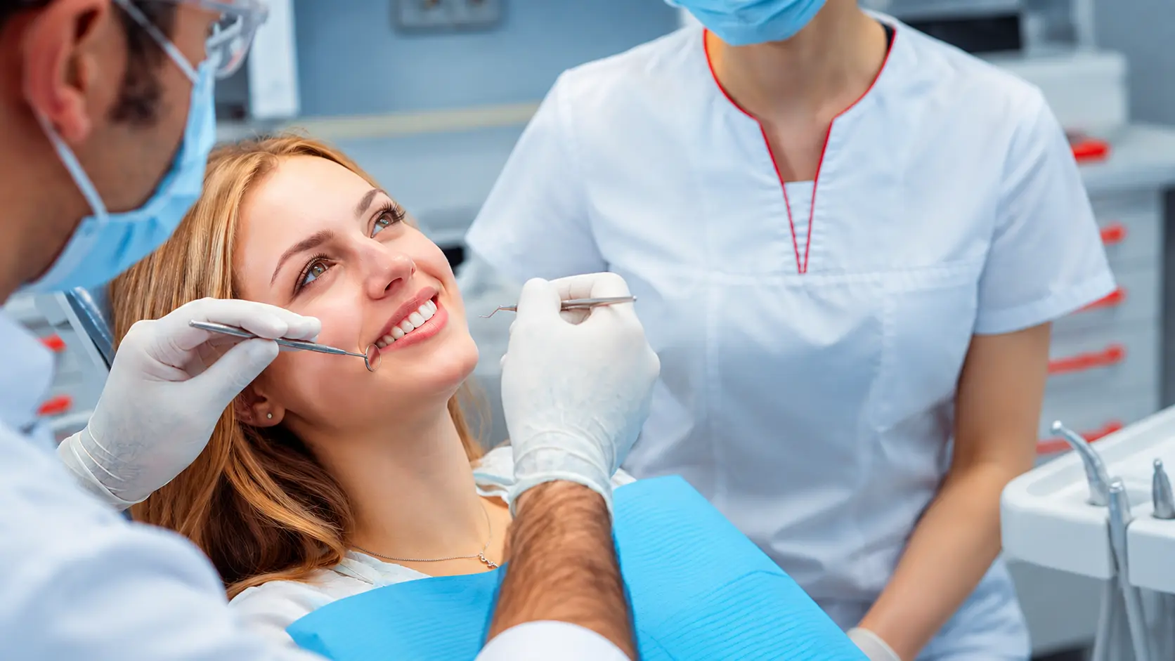A dentist treating a patient at Four Star Medical Center, Ajman